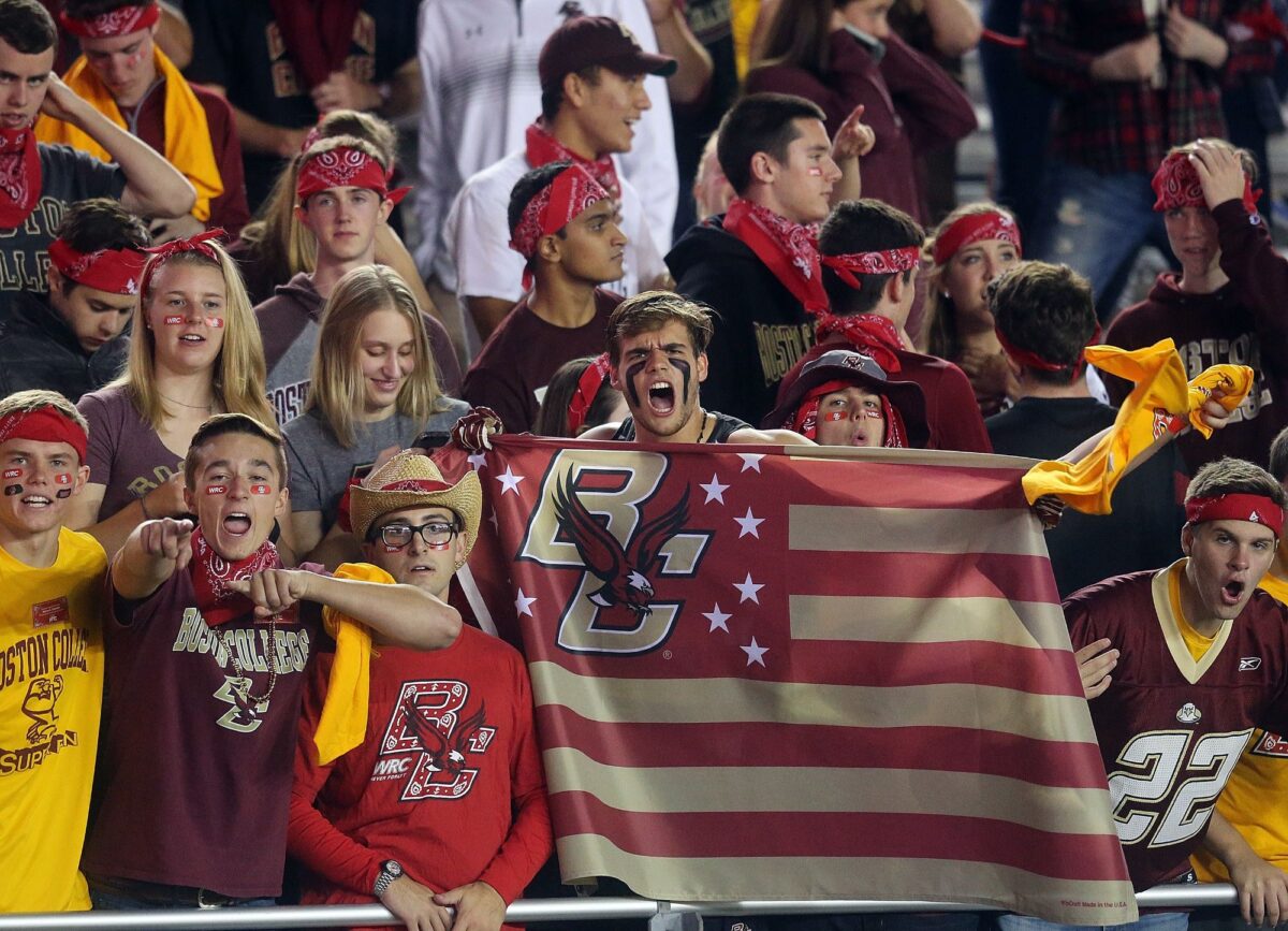 Fans of the Boston College Eagles, wearing red bandanas in honor of 9/11 hero Welles Crowther, show their support in the first half against the Clemson Tigers at Alumni Stadium on October 7, 2016 in Chestnut Hill, Massachusetts.